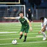 Tony Rodriguez looks for a teammate to pass to. Ben Ray / The Reporter