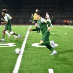 Keahi Ahuna wins with the ball down the field for Auburn. Ben Ray / The Reporter