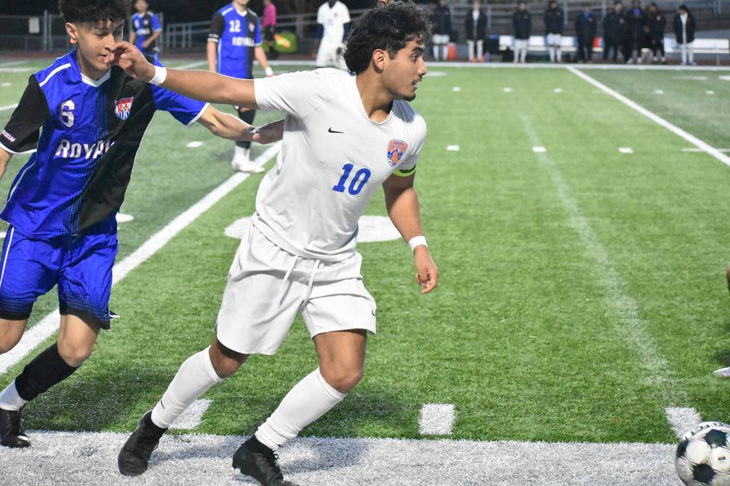 Benji Toscano looks up field against Kent-Meridian. Ben Ray / The Reporter