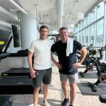 Reid, left, and Bill Wiseman at the Mercer Island Beach Club last year. Photo courtesy of Bill Wiseman