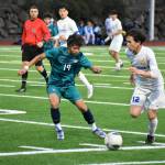 Kaden Navarro defends Tahomas Alex Rice at Auburn Riverside. Ben Ray / The Reporter
