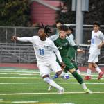 Nolan Carrillo picks up Mount Rainiers John Majankeka. Ben Ray / The Reporter