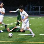 Mount Rainiers Amir Heminna controls the ball amidst chaos. Ben Ray / The Reporter