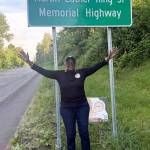 COURTESY PHOTOs, Kent Black Action Commission
Gwen Allen-Carston displays her joy about the new sign.