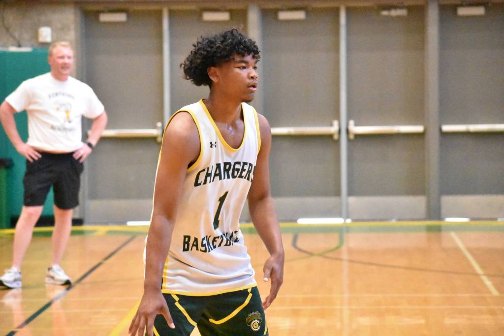 Jaylen Keowla dribbles the basketball for Kentridge. Ben Ray / The Reporter